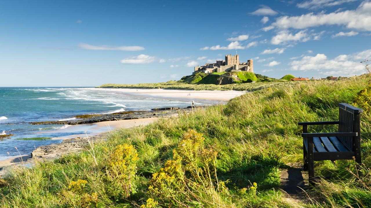 Bamburgh Castle taken here from the north dates back to the 6/7th century