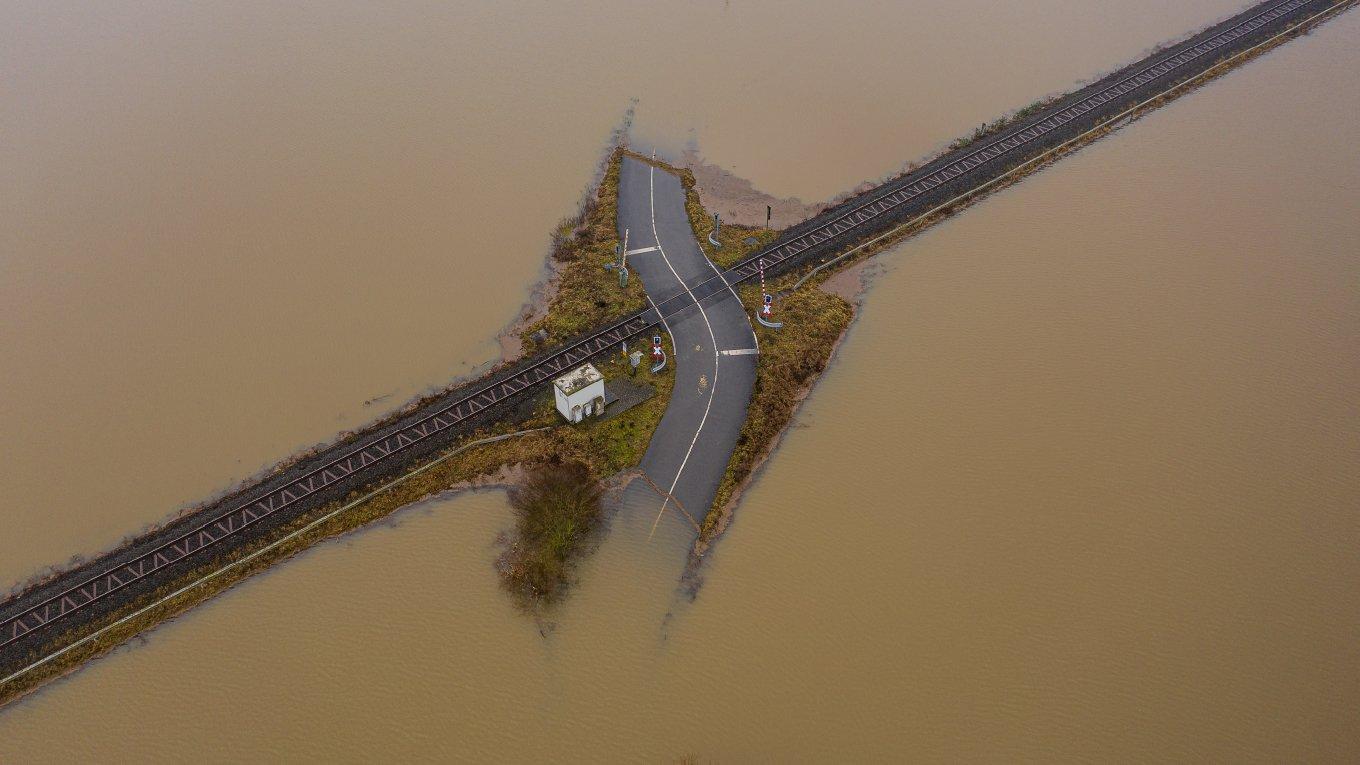 Flooded road and rail tracks